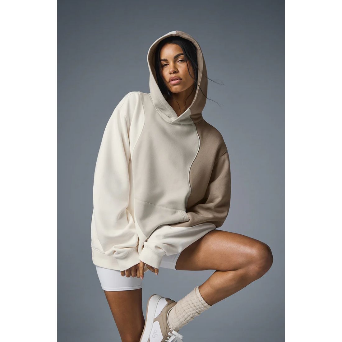 model wearing brown contrasting hoodie