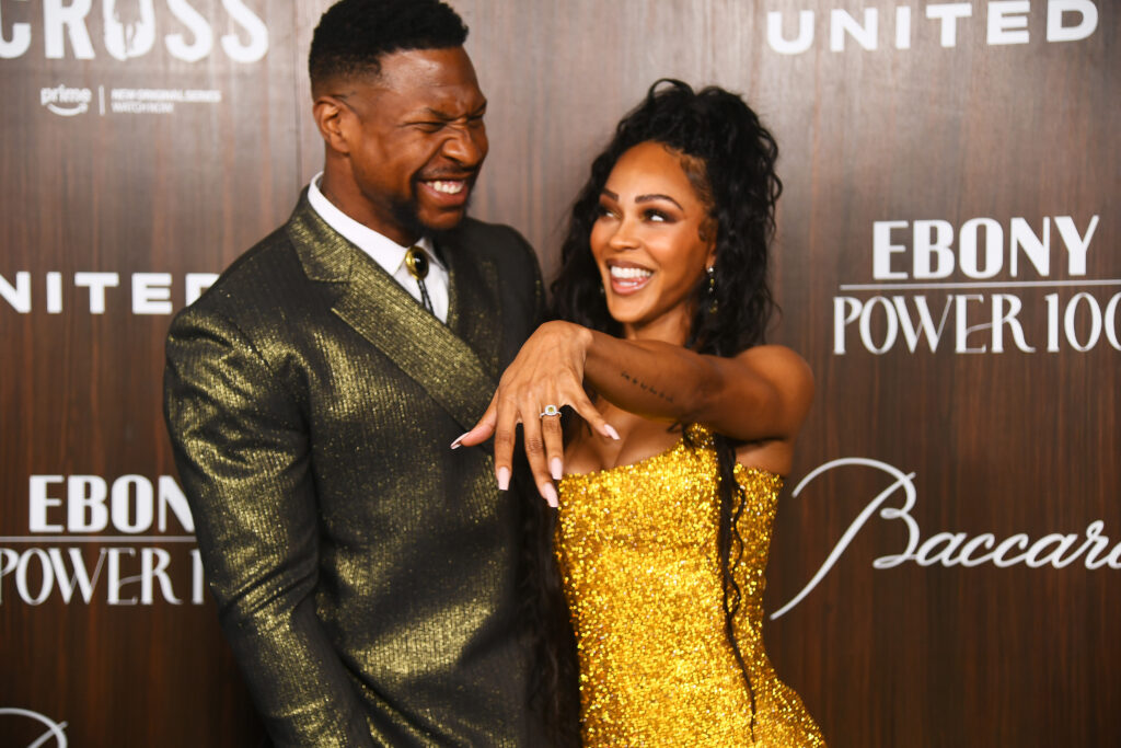 Actor Jonathan Majors and fiancee Megan Good on the red carpet at the Ebony Power 100 Gala