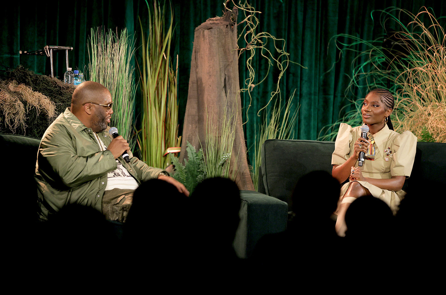 Killer Mike speaks with Doechii at Spotlight: Doechii at GRAMMY Museum L.A. Live on December 18, 2024 in Los Angeles, California.