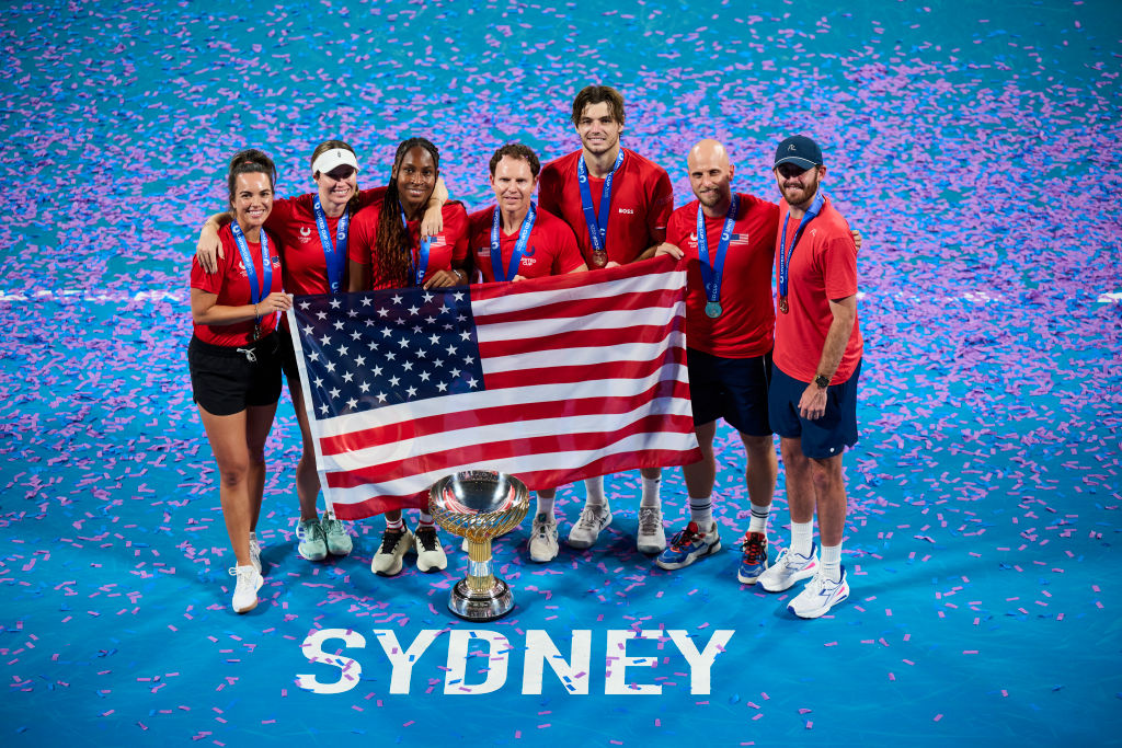 Team United States members, Coco Gauff, Taylor Fritz, Denis Kudla, Robert Galloway, Danielle Collins, Desirae Krawczyk and Michael Russell pose for a photo with the United Cup after victory over Poland during day 10 of the 2025 United Cup at Ken Rosewall Arena on January 05, 2025 in Sydney, Australia