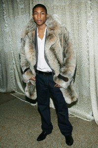 NEW YORK - DECEMBER 6:  Singer Pharrell Williams attends a preview gala dinner for the Metropolitan Museum's "Wild: Fashion Untamed" exhibition, hosted by fashion designer Robert Cavalli, on December 6, 2004 at the Metropolitan Museum of Art, in New York City. (Photo by Evan Agostini/Getty Images)
