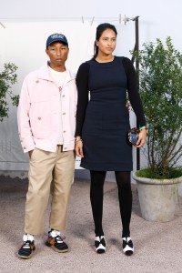 PARIS, FRANCE - JANUARY 21: Pharrell Williams and his wife Helen Lasichanh attend the Chanel Haute Couture Spring/Summer 2020 show as part of Paris Fashion Week at Grand Palais on January 21, 2020 in Paris, France. (Photo by Julien M. Hekimian/Getty Images for Chanel)