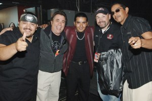 Los Lonely Boys Ringo Garza, Jojo Garza and Henry Garza with Steve Gudis at Farm Aid on September 30, 2006.