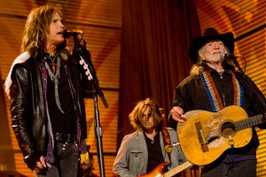 MILWAUKEE, WI-  OCTOBER 02:  Steven Tyler (L) and Willie Nelson perform on stage at Farm Aid 25: Growing Hope for America at Miller Park on October 2, 2010 in Milwaukee, Wisconsin.  (Photo by Darren Hauck/Getty Images)