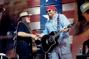 Toby Keith (R) performing with Willie Nelson (L) at Farm Aid at the Post Gazette Pavilion in Burgettstown, Pennsylvania on September 21, 2002.